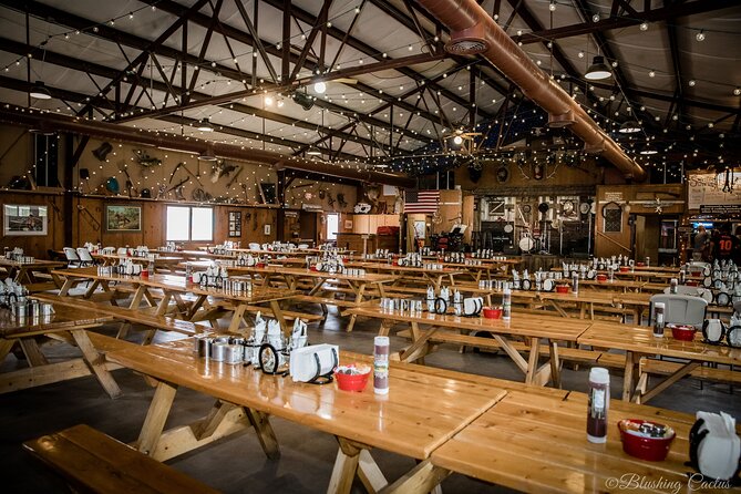 The VIP Experience, Chuck Wagon Dinner and Show Tickets - The Dinner Barn Meal: Tin Plates, Chicken and Ribs, and Classic Fixins